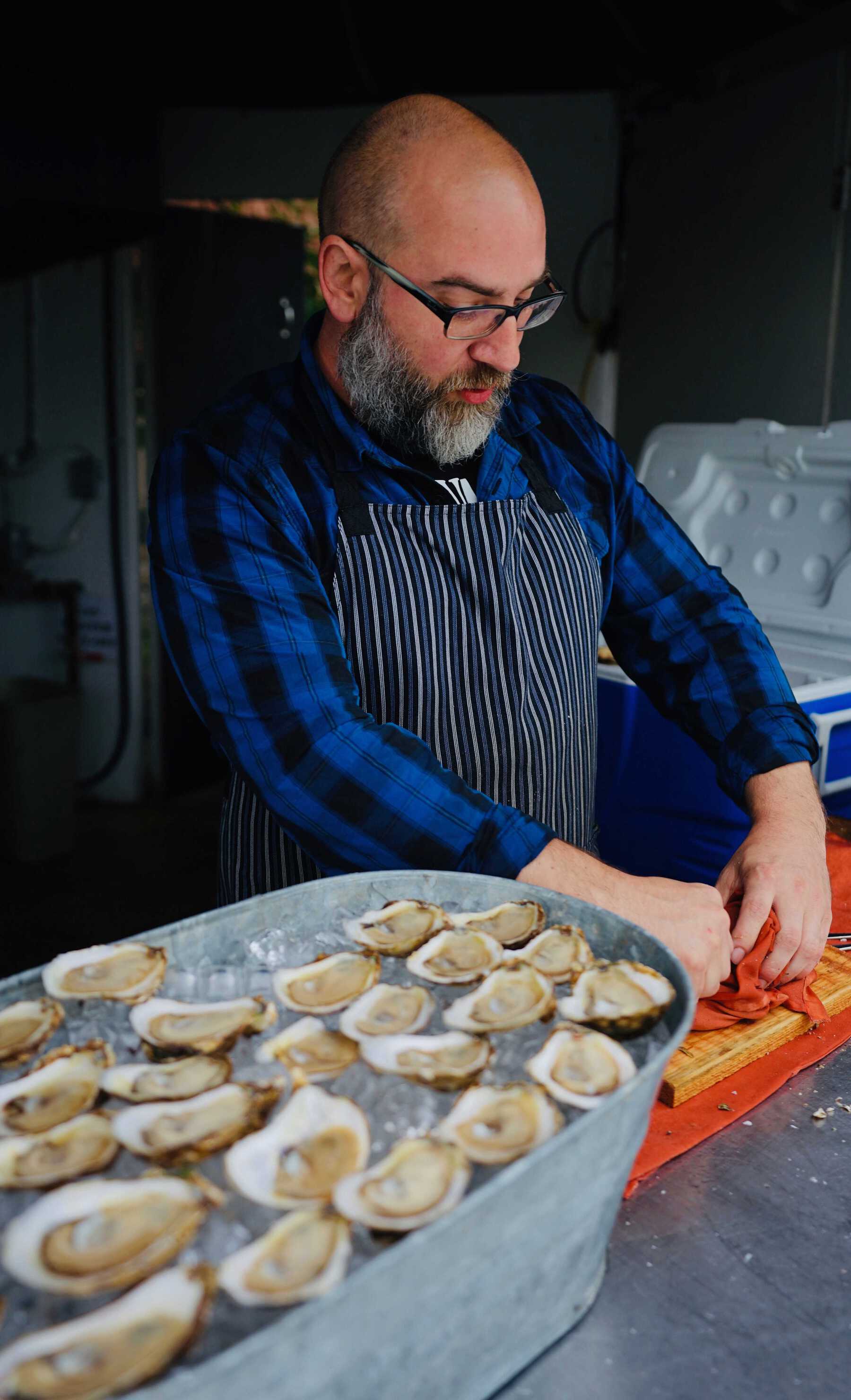 Man preparing oysters